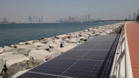 Solar panel powering decorative lights along the promenade of Palm Jumeirah I Stock Footage 312333239