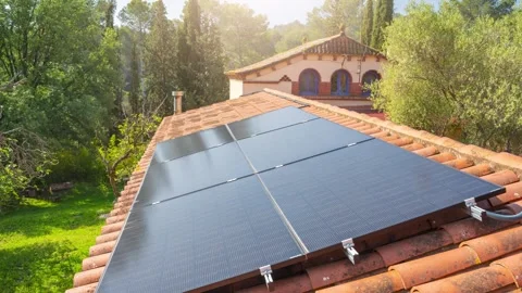 Solar Panel in a private home scene at cloudy sunset timelpase Stock Footage 274478911