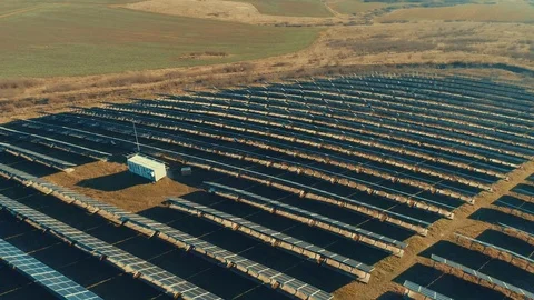 Solar panel produces green, environmentaly friendly energy from the setting sun Video stock 123484143