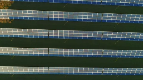 Solar panel produces green, environmentaly friendly energy from the setting sun Stock-Footage 123484539