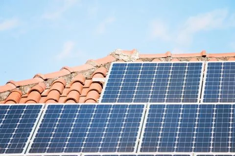 Solar Panel On A Red Roof Stock Photos
