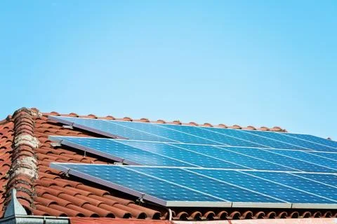 Solar Panel On A Red Roof Stock Photos