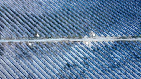 Solar panel with road middle, view from top Stock Photos