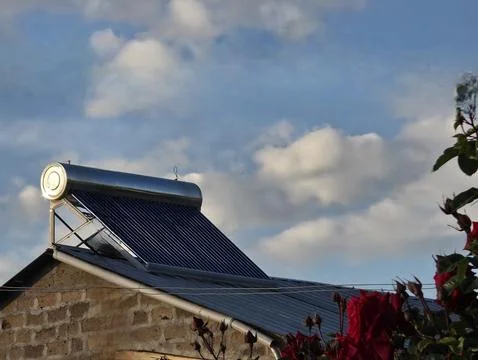 Solar Panel on Rooftop with Blue Sky Stock Photos