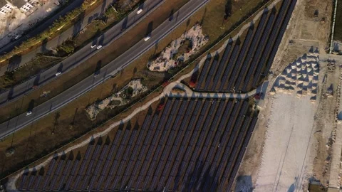 Solar panel rows and highway aerial view. Photovoltaic panels farm. Dominican Stock-Footage 268757044