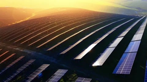 Solar panel rows illuminated at sunset, Bulgaria Video stock 340409079