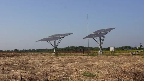Solar Panel Structures in Dry Agricultural Field Stock Footage 326161769