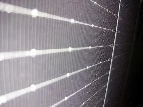 Solar Panel Surface Showing Grid Lines and Light Reflections During Daytime Stock Photos