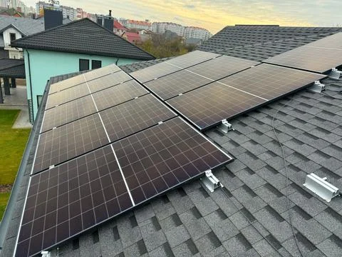 Solar panel system being installed outdoors, eco-friendly energy concept Stock Photos