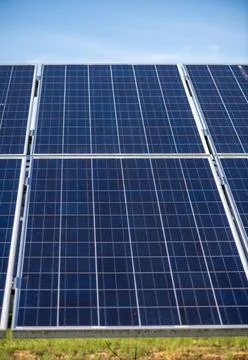 Solar panel texture with blue surface lines. Solar energy system with renewab Stock Photos