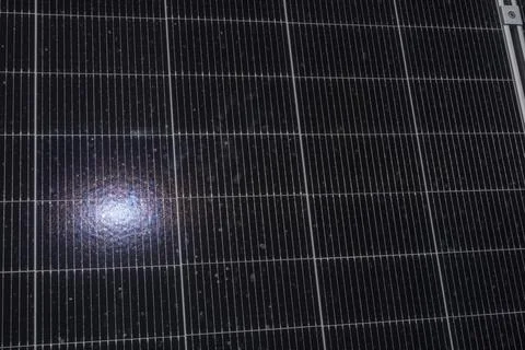 Solar panel texture with sunlight reflection, renewable energy background Stock Photos