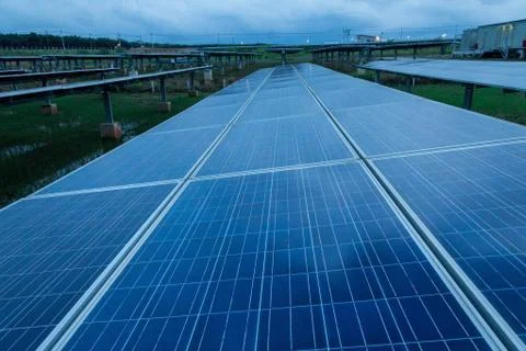 The solar panel tracking system with cloud storm in evening Stock Photos