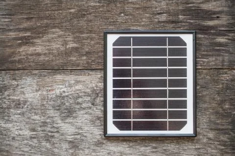 Solar panel on the wooden background 스톡 사진