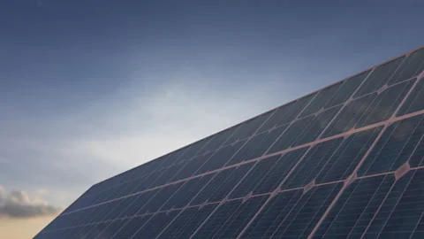 Solar panels 3D in the evening sunset timelapse background. Solar cell farm p Stock Footage 131066888