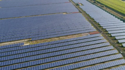 Solar panels, aerial view over photovoltaic system Stock Footage 94657404