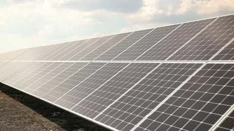 Solar panels against deep blue sky. Solar cells farm. Photovoltaic energy Stock-Footage 152426643