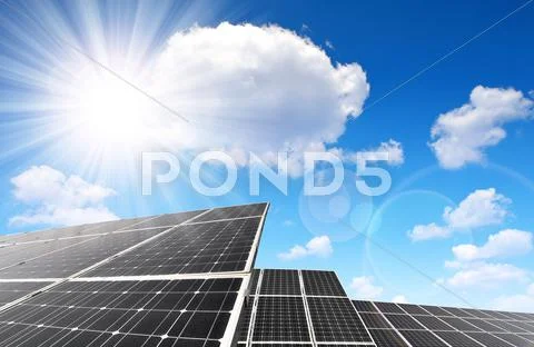 Solar panels against sunny sky. Stock Photos