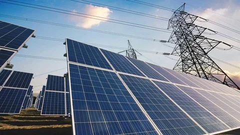 Solar panels and power lines Stock Footage 72594597