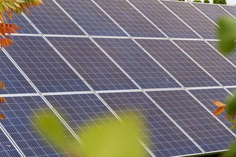 Solar panels are positioned at an angle to capture sunlight effectively, co.. Stock Photos