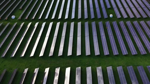 Solar panels arranged in rows at a renewable energy site Stock Footage 325087433