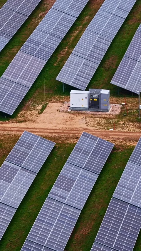 Solar panels array field generating clean electricity energy prices Stock-Footage 335118413
