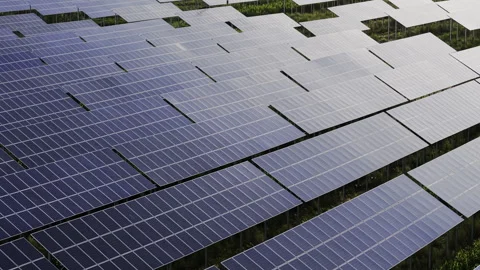 Solar Panels Array Photovoltaic Farm Renewable Energy 4K Forward Tilt Down Stockbeeldmateriaal 343157049