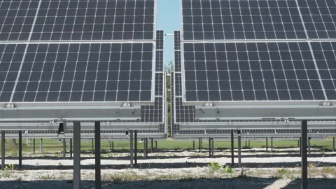 Solar panels arrays installed in rows at renewable photovoltaic power plant Stock-Footage 334318203