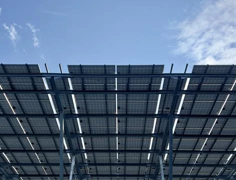 Solar panels on the background of a blue sky. The concept of alternative green Stock Photos