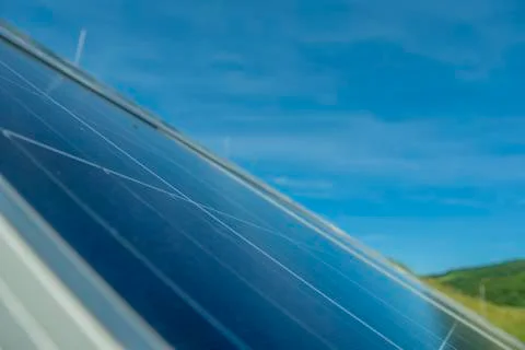 Solar panels on blue sky background close-up Stock Photos