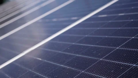 Solar panels capturing sunlight in a close-up sequence, showcasing the intricate Video stock 319534617