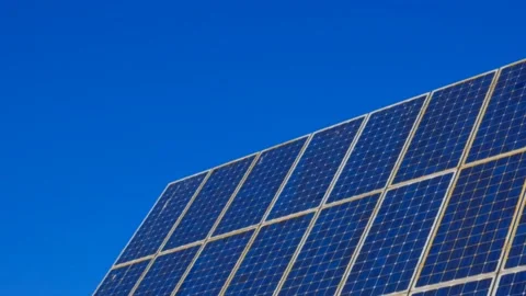 Solar panels  close-up on a blue sky background Vidéo 169633193