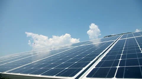 Solar panels with clouds in the back Stock Footage