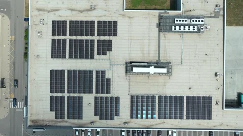 Solar panels covering large building roof, providing sustainable energy Stock Footage 313662353