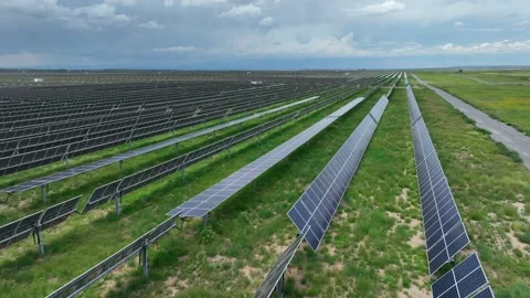 Solar panels facing different directions to optimize and maximize energy Stock Footage 246510163