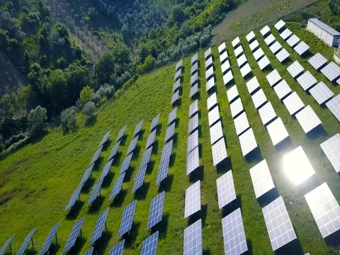 Solar panels farm field of green renewable energy Stock Footage