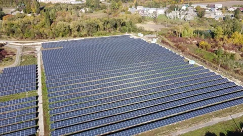 Solar panels on a farm Stock Footage 162864354