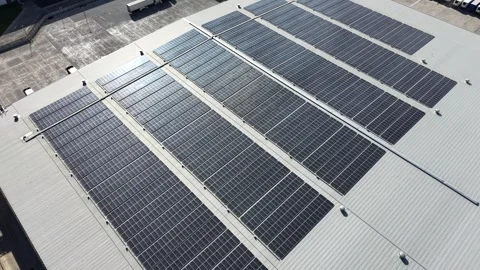 Solar panels farm producing renewable energy on a rooftop Stock-Footage 341918377