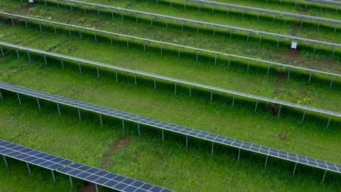 Solar panels on the field, rear view. The conversion of solar radiation into Stock Footage 156025868