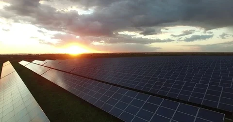 Solar panels in a field at sunset, close-up Video stock 74370942