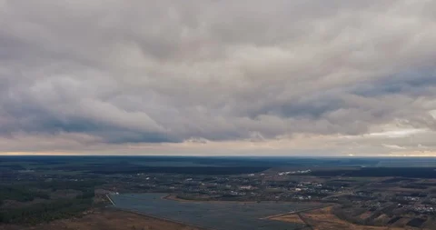 Solar panels in the field. thunderclouds move quickly and the sky brightens Stock Footage 130057182