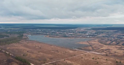 Solar panels in the field. thunderclouds move quickly and the sky brightens Stock Footage 130057238