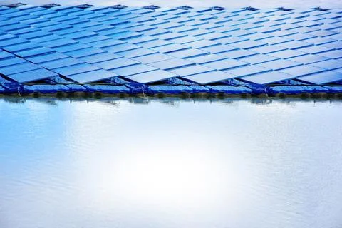 Solar panels float on the surface of the lake Stock Photos