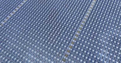 Solar panels floating in a lake seen from a drone perspective,View of the flo Stock Footage 257043532