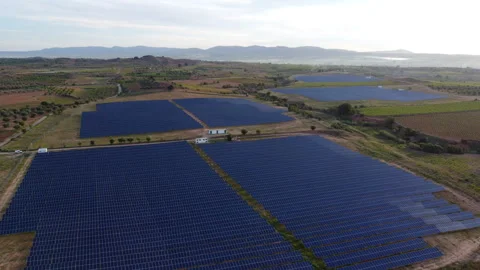 Solar panels grouped together in a solar farm in Spain, drone shot. Stock-Footage 258294505