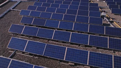 Solar panels installation and mounting on the top roof of the city building.  Stock Footage 196163071