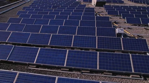 Solar panels installation and mounting on the top roof of the city building.  Stock Footage 196163082
