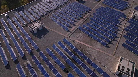 Solar panels installation and mounting on the top roof of the city building.  Stock Footage 196163144