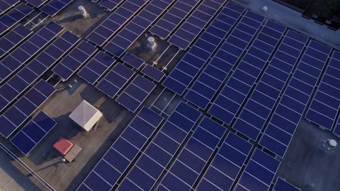 Solar panels installation and mounting on the top roof of the city building.  Stock Footage 196163204