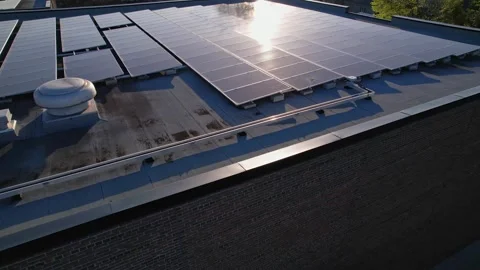 Solar panels installation and mounting on the top roof of the city building.. Stock Footage 241744733