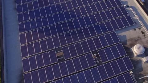 Solar panels installation and mounting on the top roof of the city building.. Stock Footage 241744779